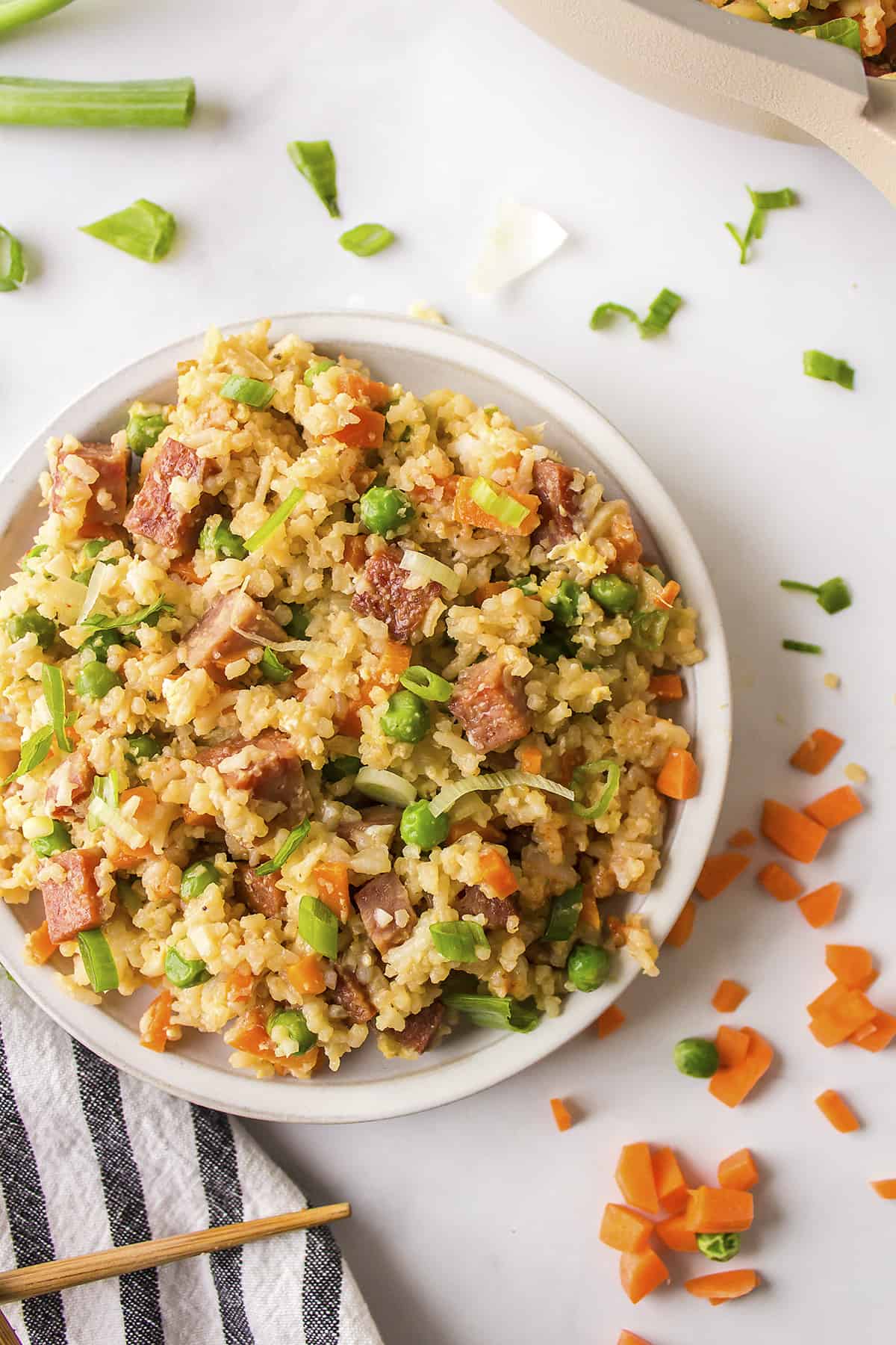 Spam fried rice in white bowl.