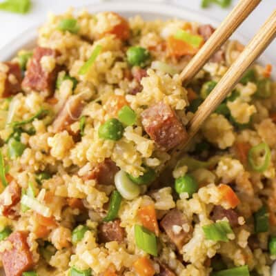 Spam fried rice with chopsticks.