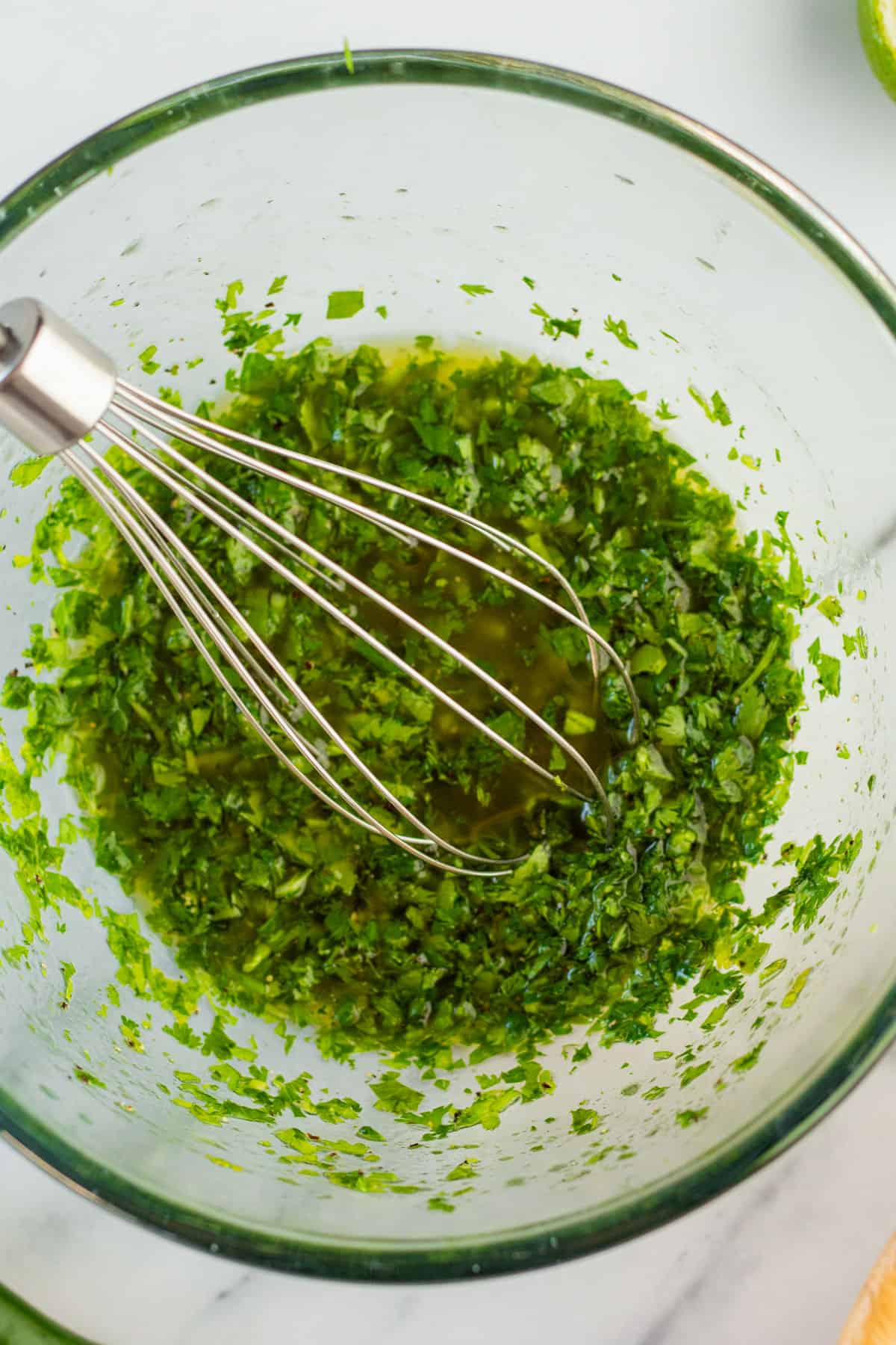 Dressing in mixing bowl.