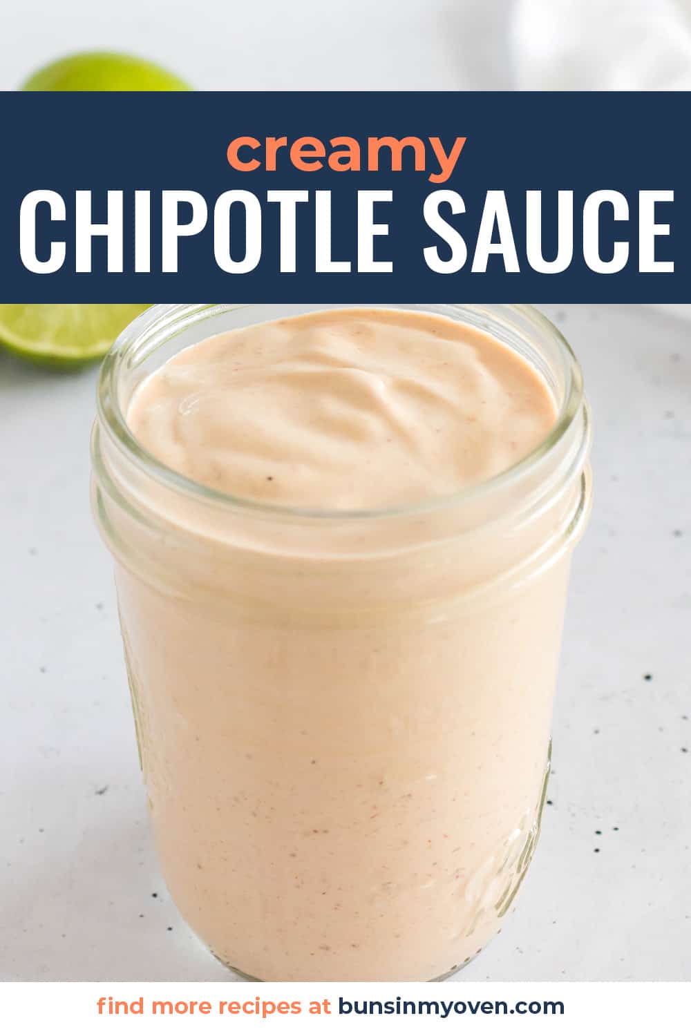 Jar full of chipotle sauce.