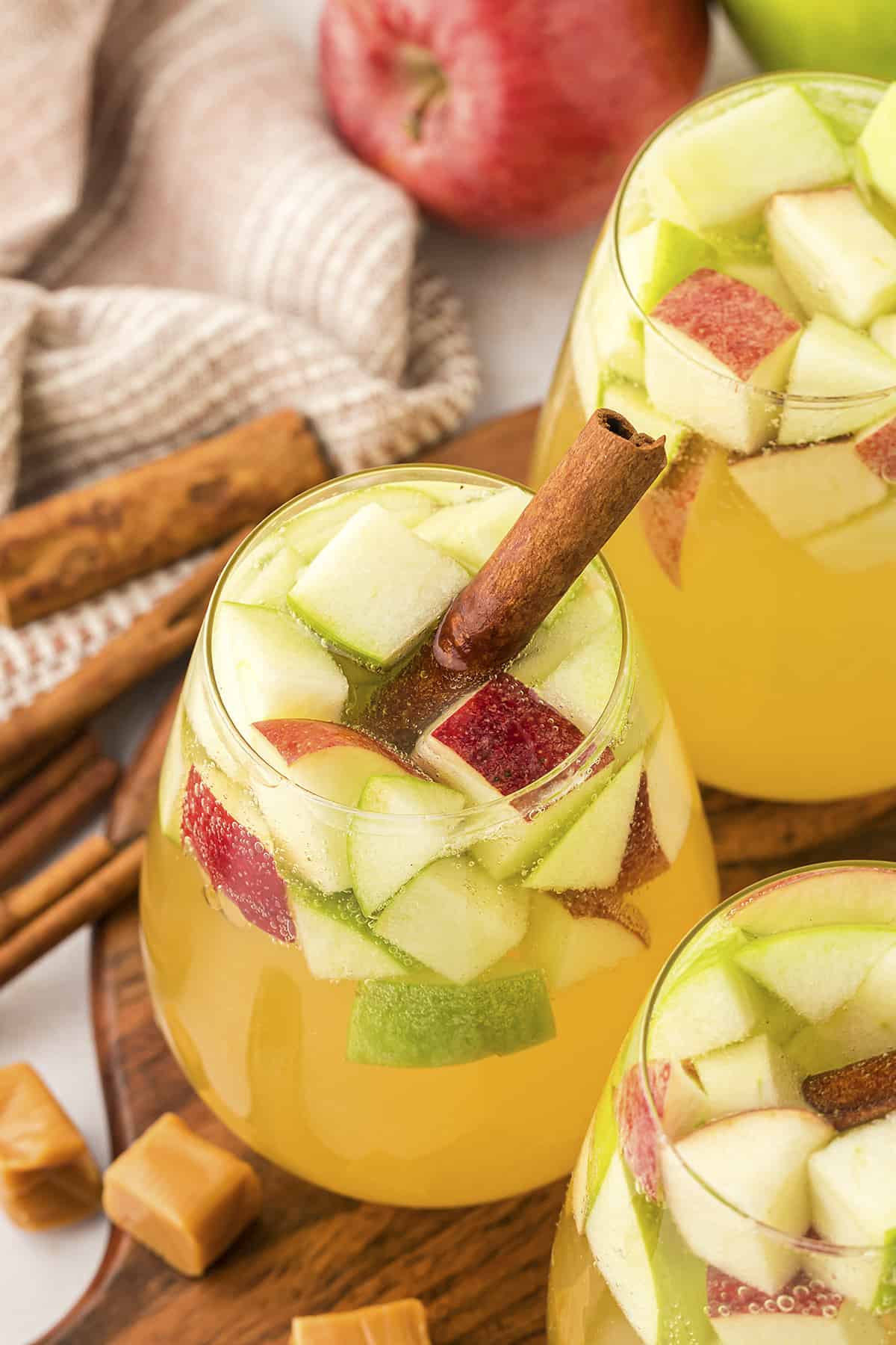 Caramel apple sangria in small glass.