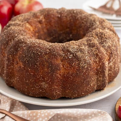 Donut cake on white plate.