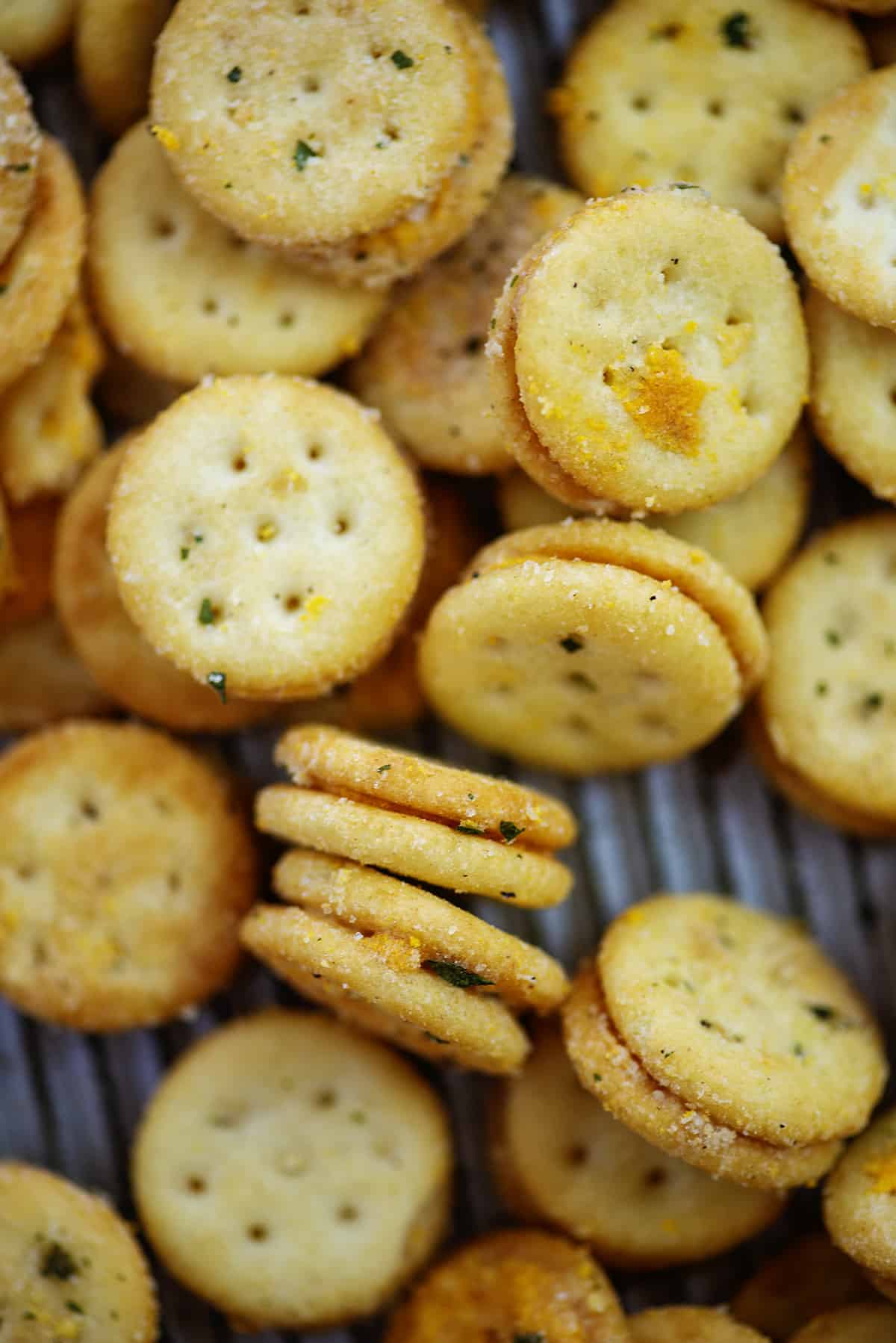 Ranch ritz bits piled on baking sheet.