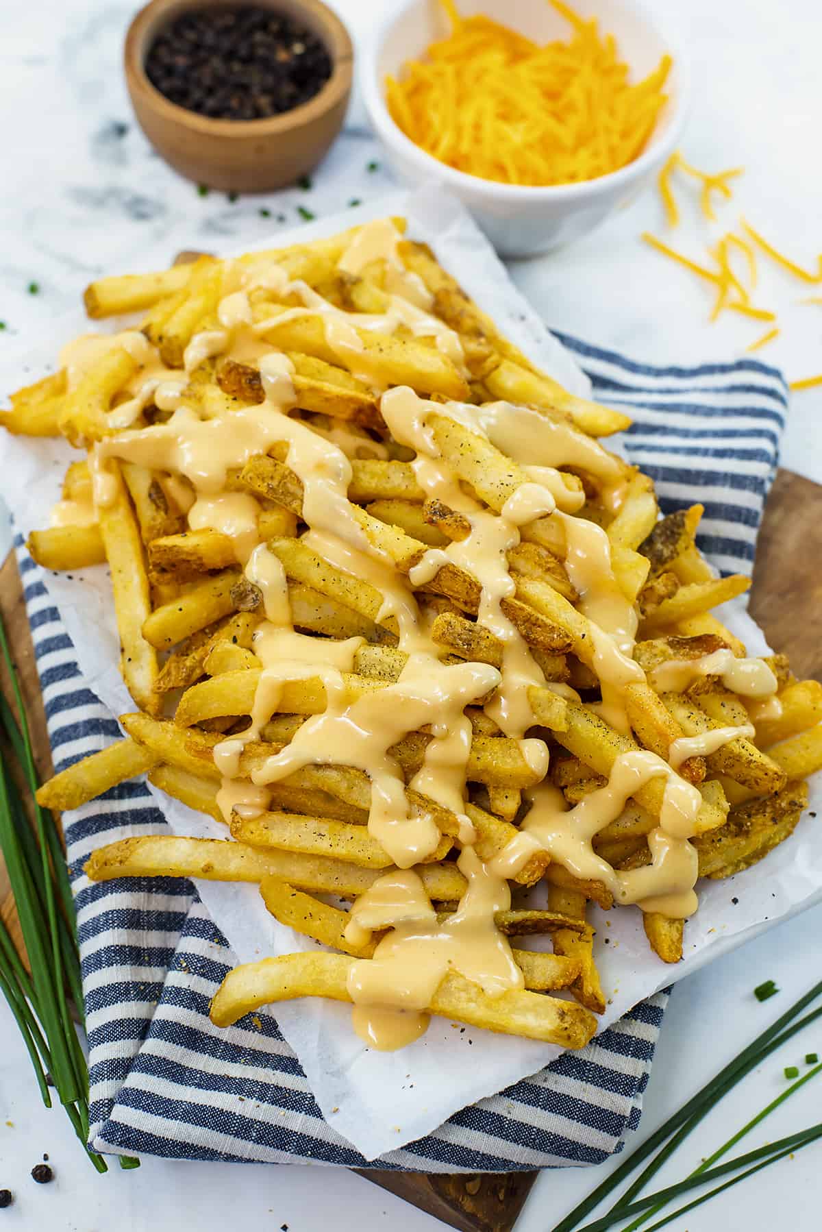 French fries drizzled with cheese sauce.