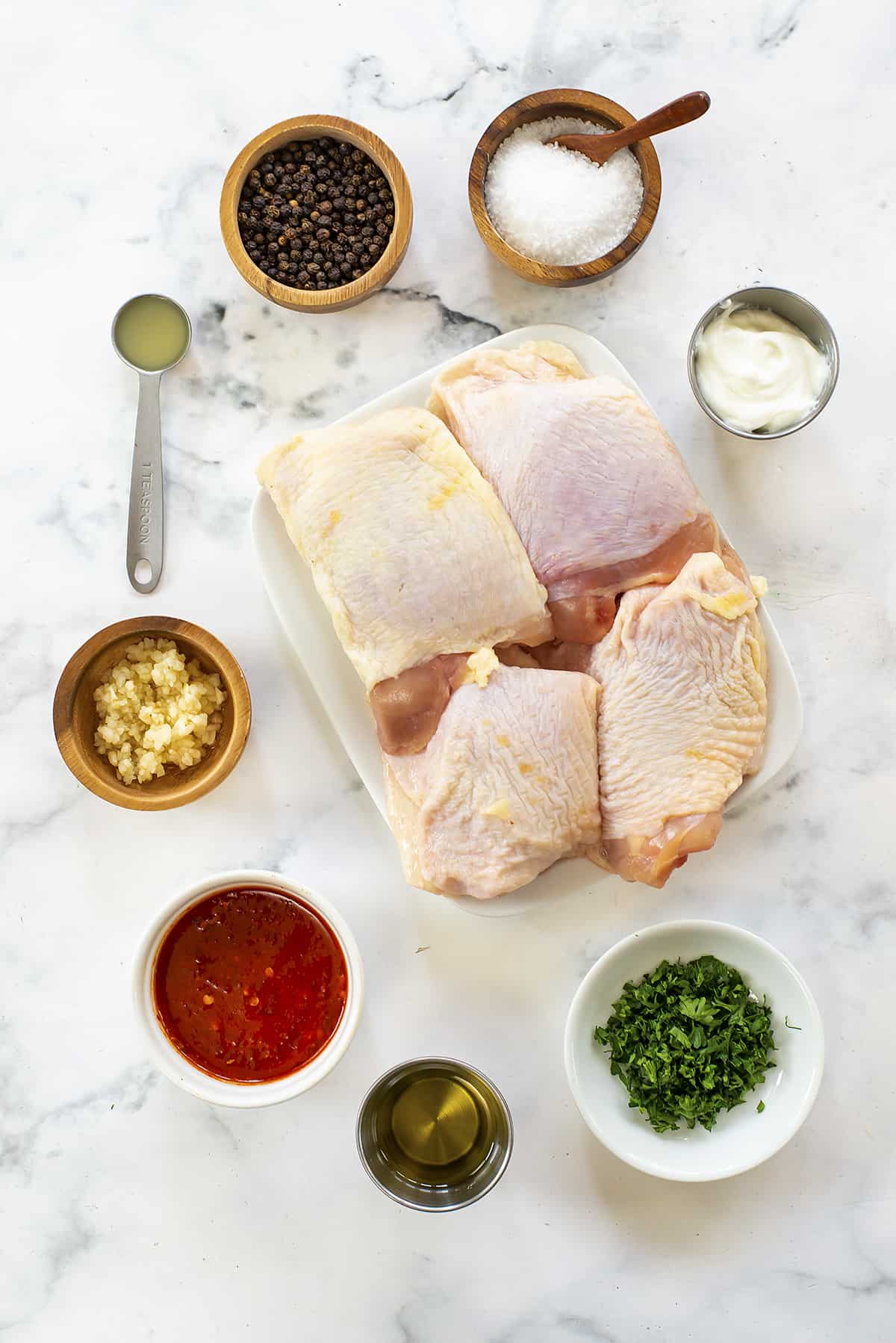 Ingredients for Harissa chicken thighs.