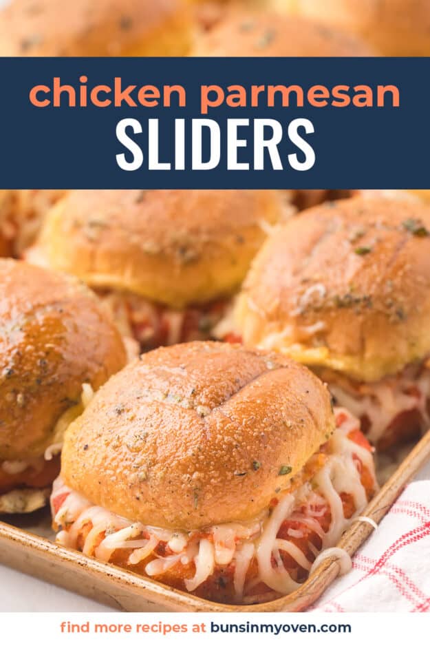 Chicken parmesan sliders on baking sheet with text for Pinterest.