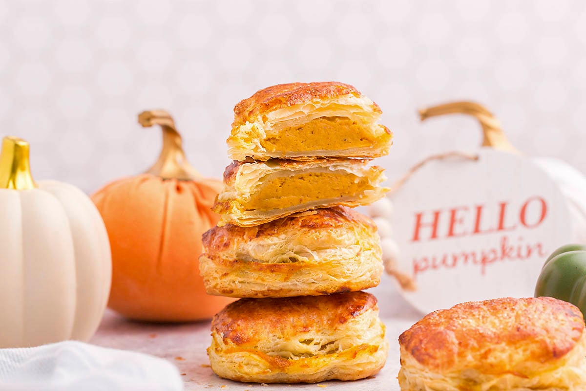 Stack of pumpkin puff pastry on counter.