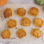 Pumpkin puff pastry on parchment paper.