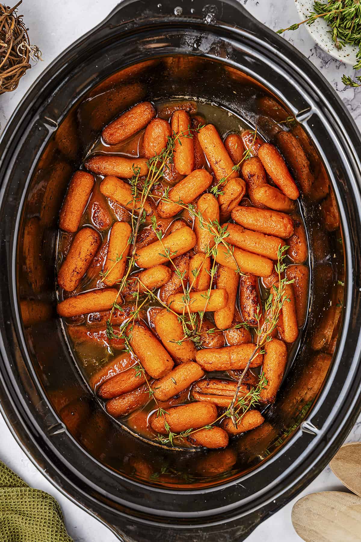 Overhead view of carrots in slow cooker.