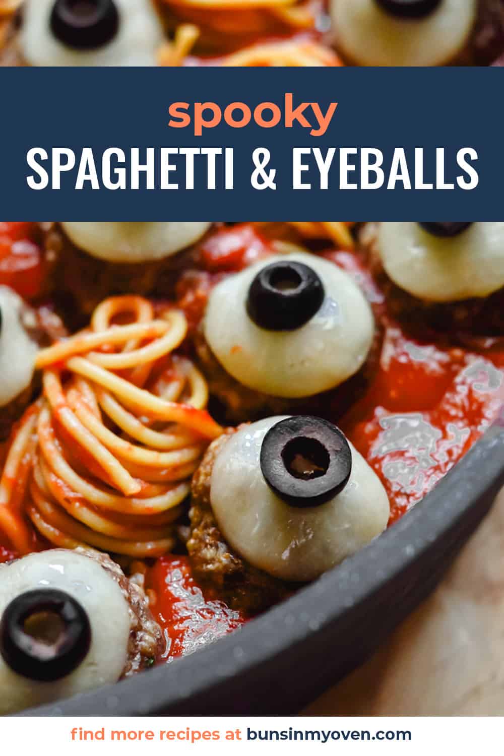 Eyeball meatballs in pot of spaghetti.