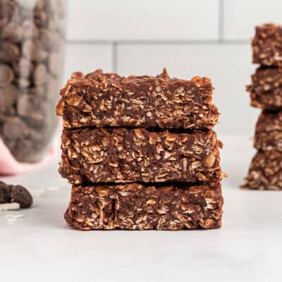 Stack of coconut chocolate bars on counter.