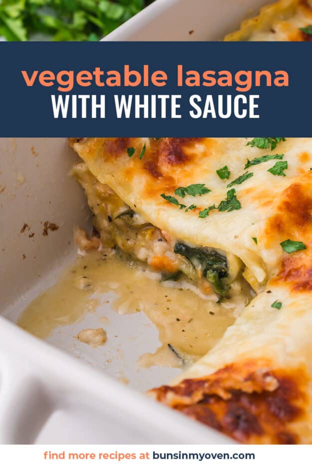 Veggie lasagna in white baking dish.