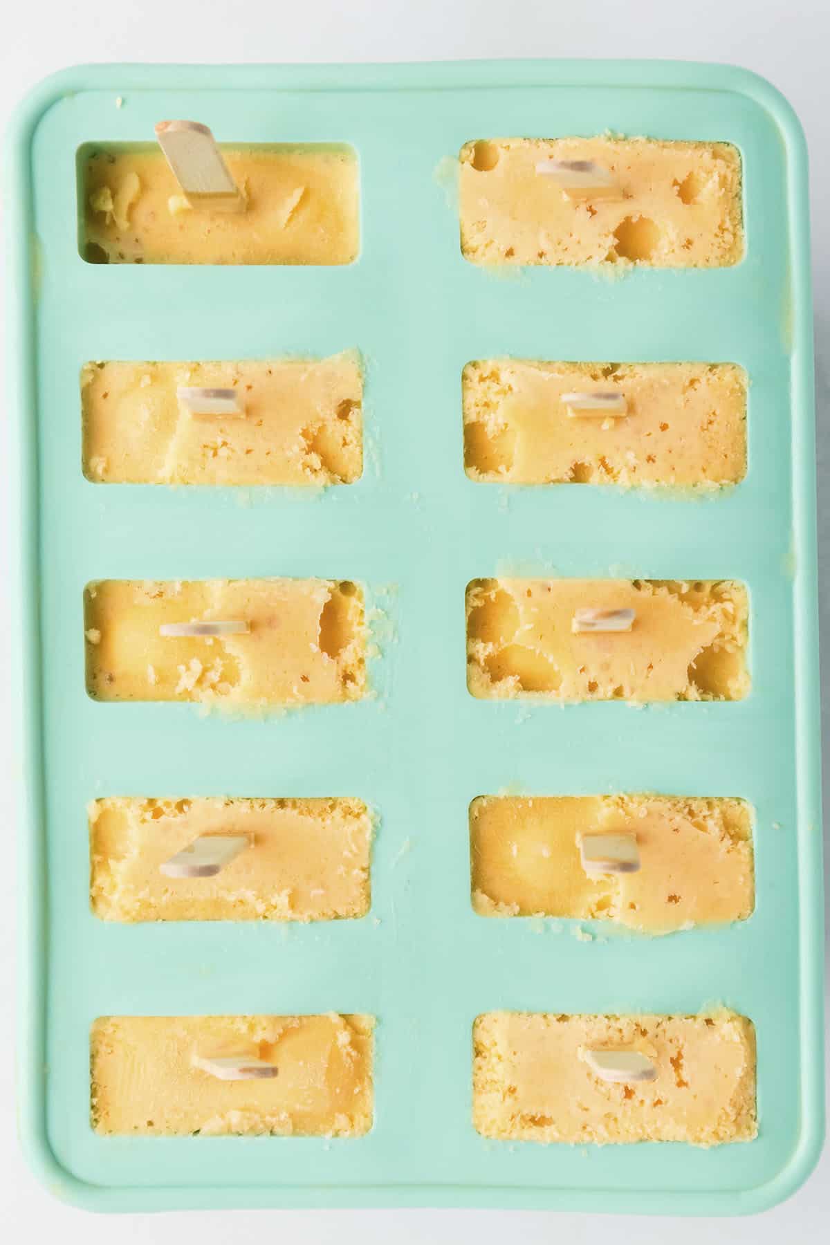 Frozen popsicles in mold.