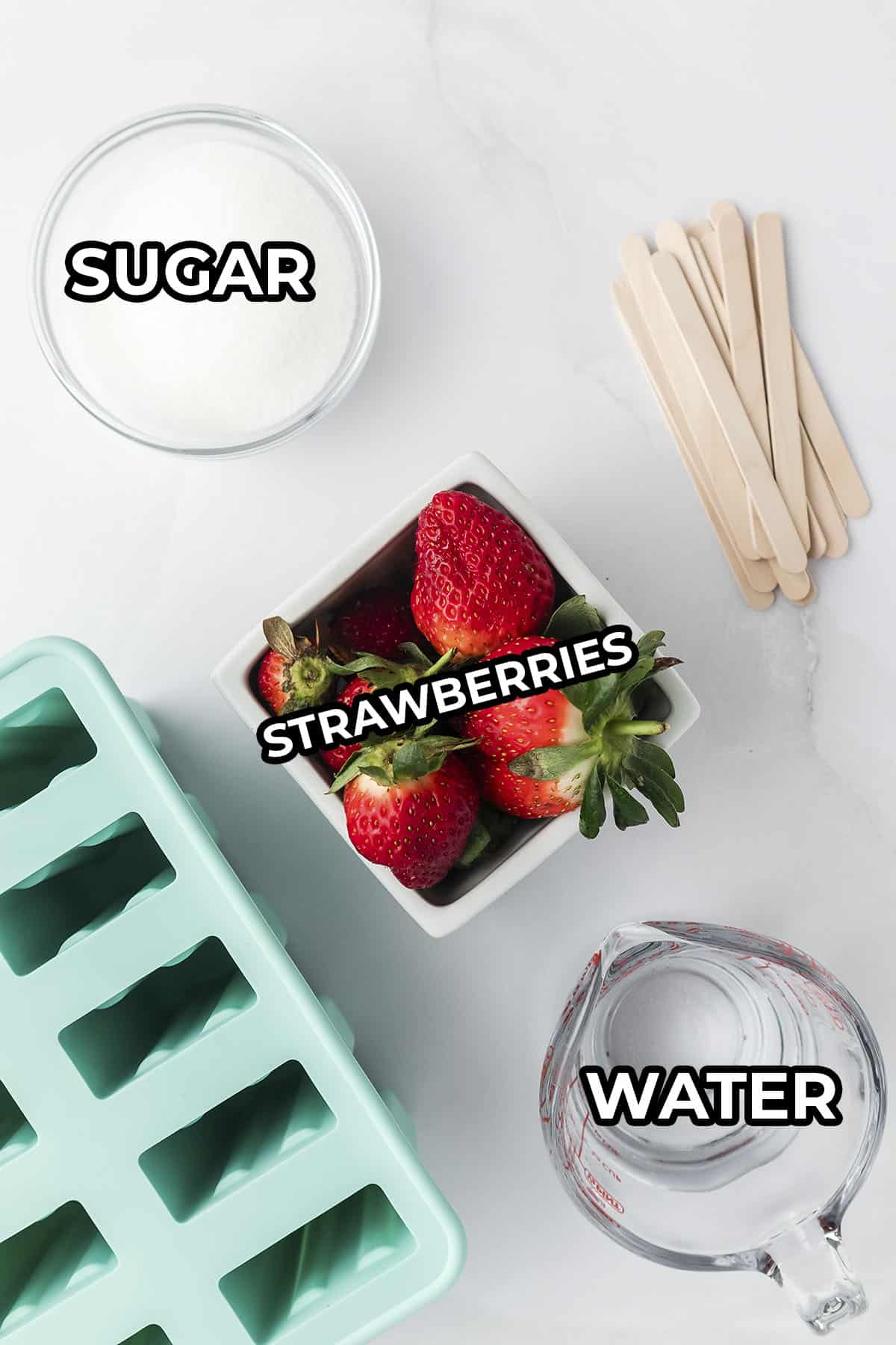 Ingredients for strawberry popsicle recipe.