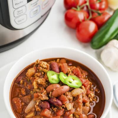 Turkey chili next to Instant Pot.