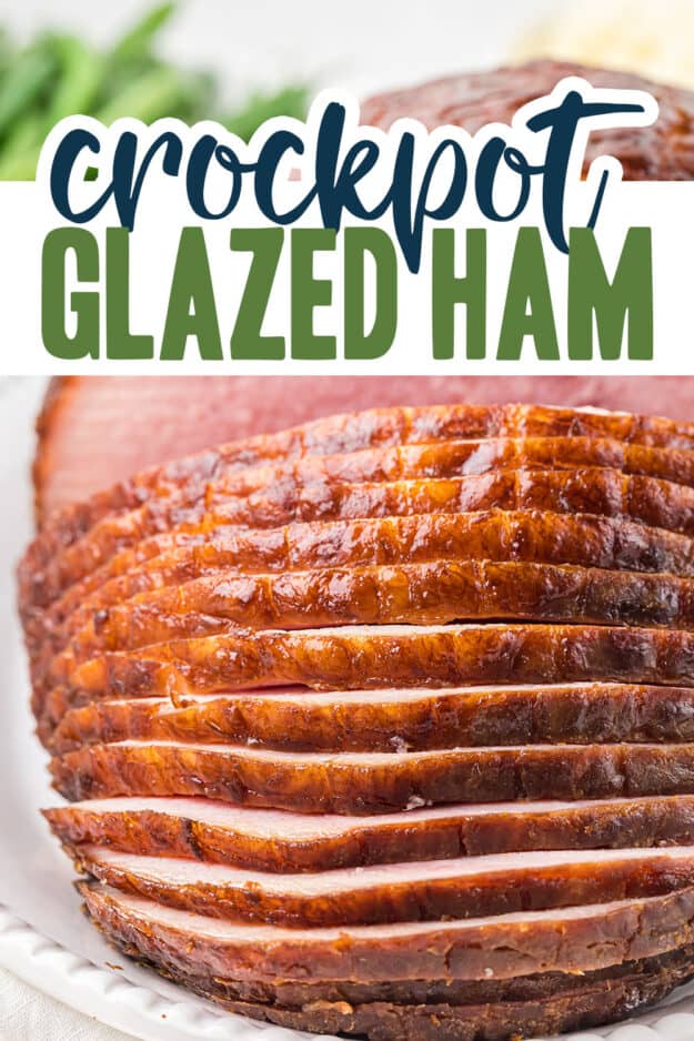 Sliced glazed ham on platter.