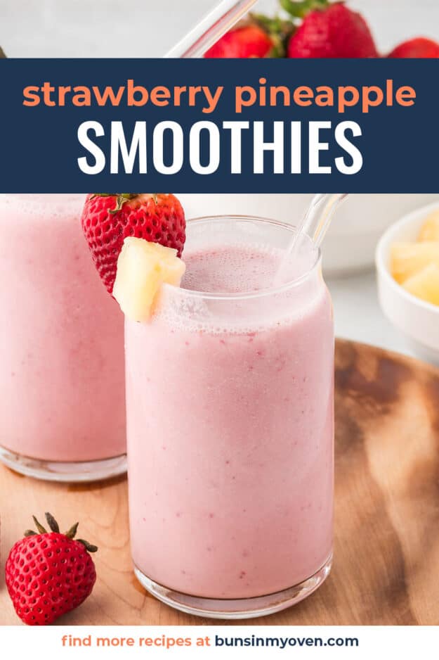 Strawberry and pineapple smoothie in glass.