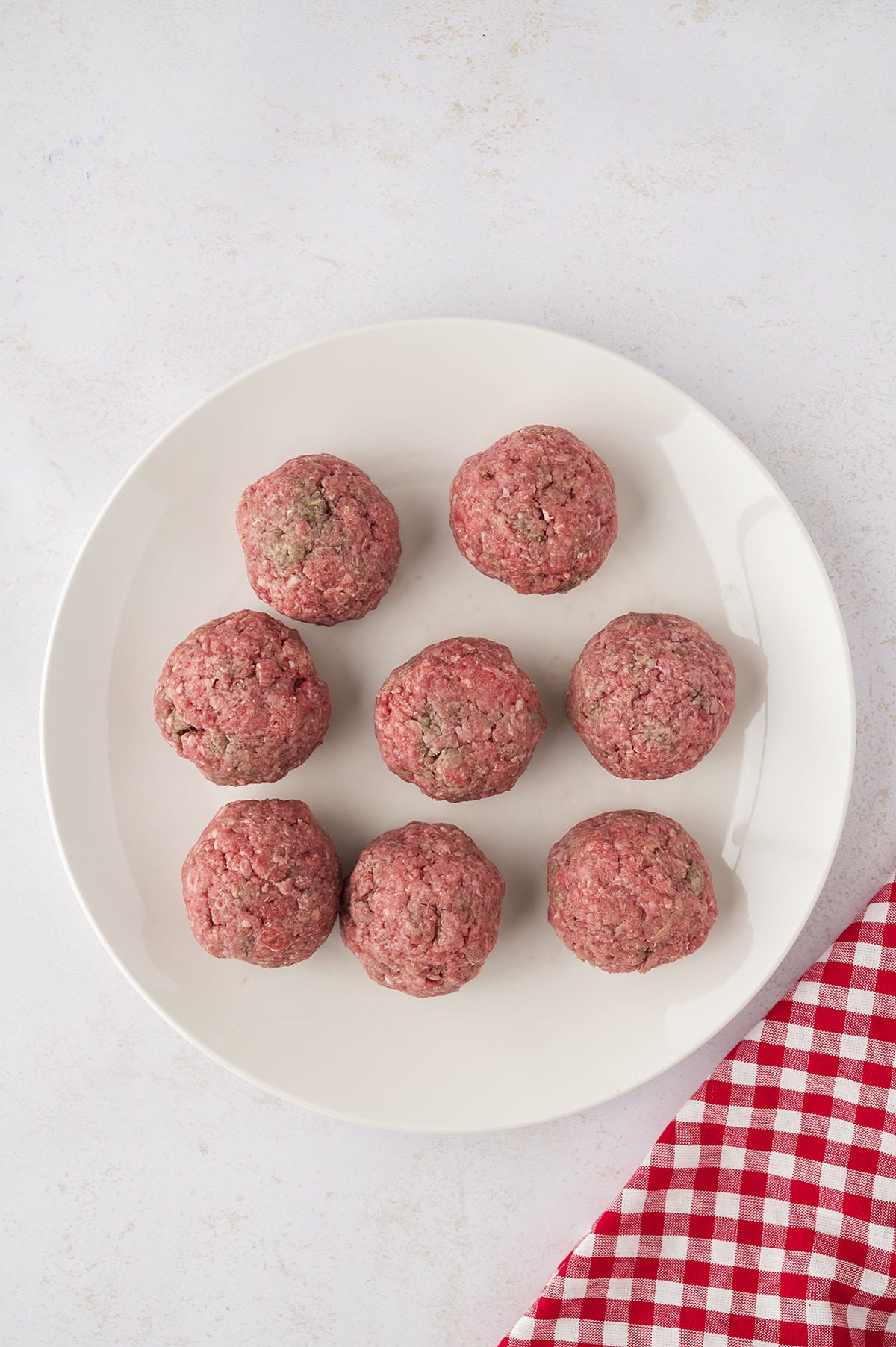 Seasoned balls of ground beef.