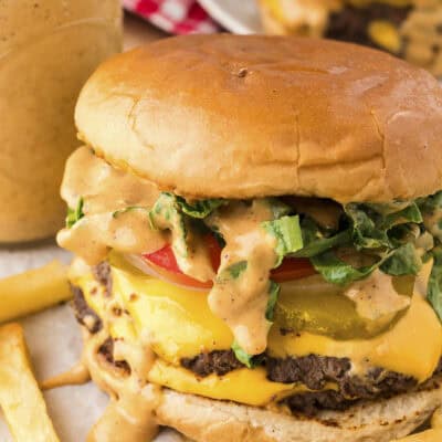 Smashburger dripping with smash burger sauce.