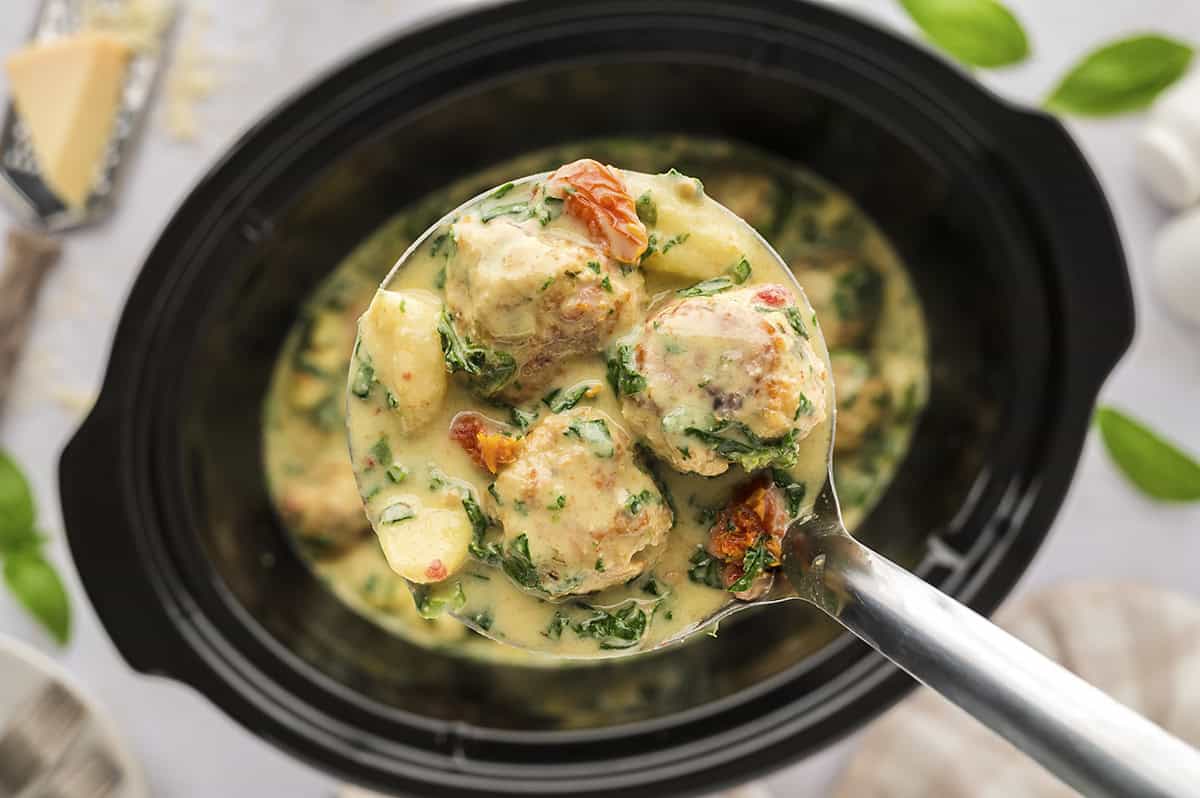 Slow Cooker Tuscan Chicken Meatballs with Gnocchi from Buns In My Oven