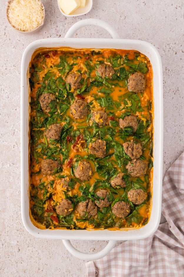 Creamy baked tomato orzo in 9x13 dish.