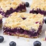Blueberry pie bars on counter.