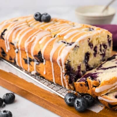 Blueberry muffin bread on cutting board.