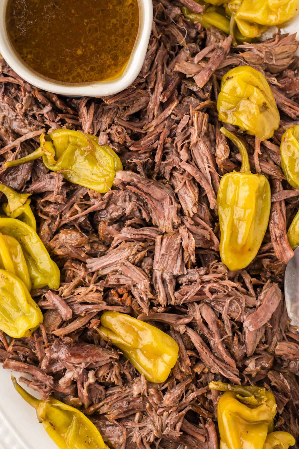 Shredded Mississippi pot roast on serving platter.