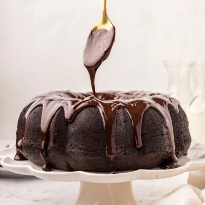 Ganache drizzled over cake.