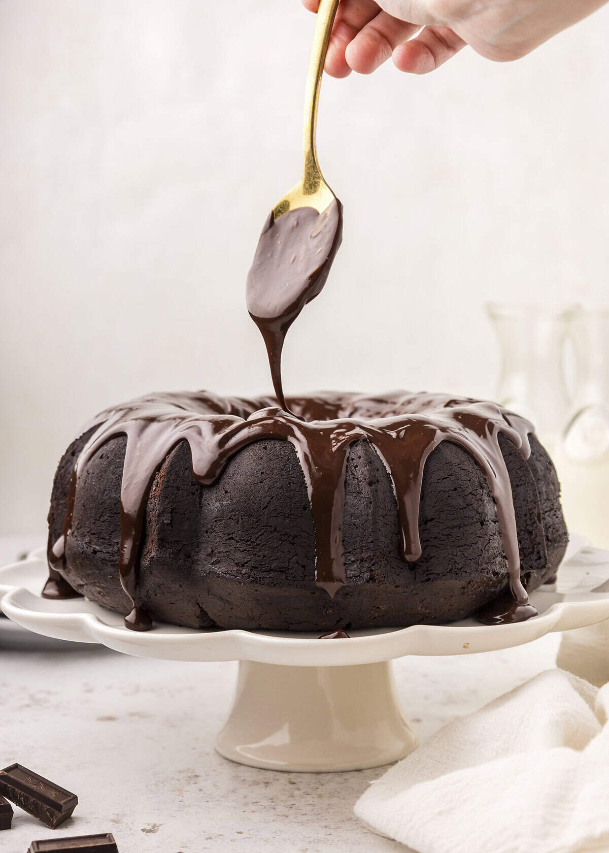 Ganache drizzled over cake.