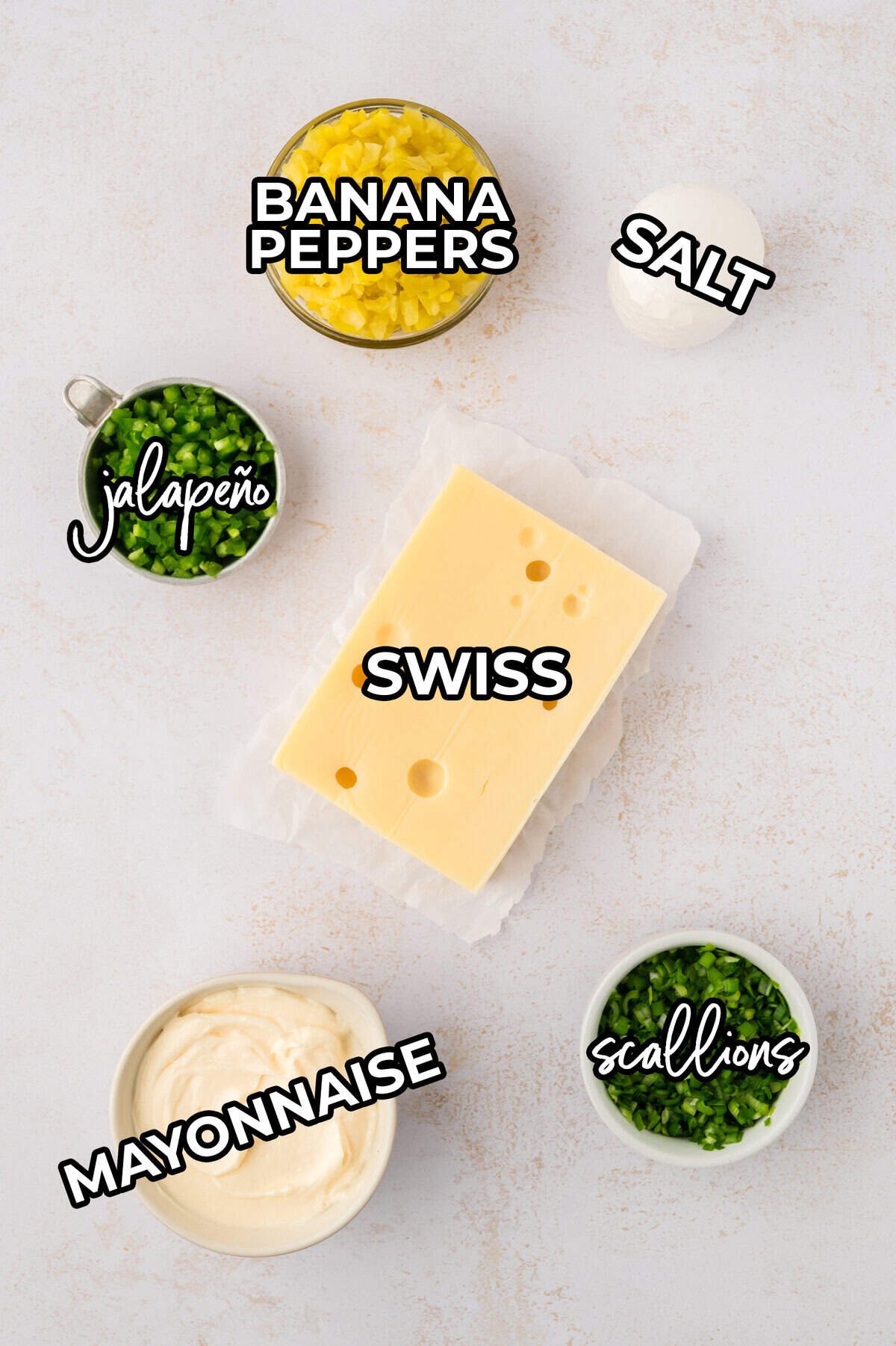 Ingredients for cheese slaw laid out on counter.