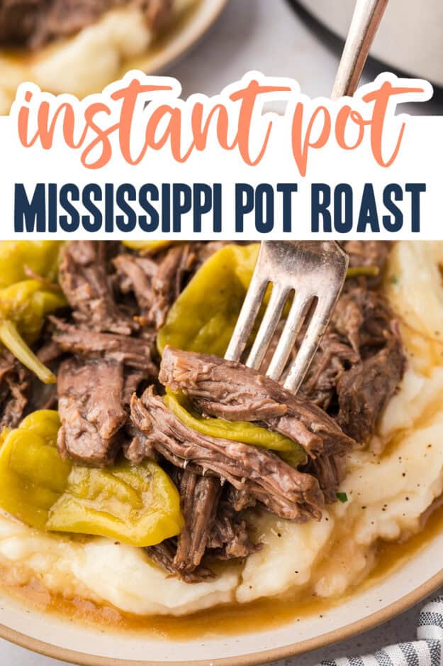 Mississippi pot roast on plate full of mashed potatoes.