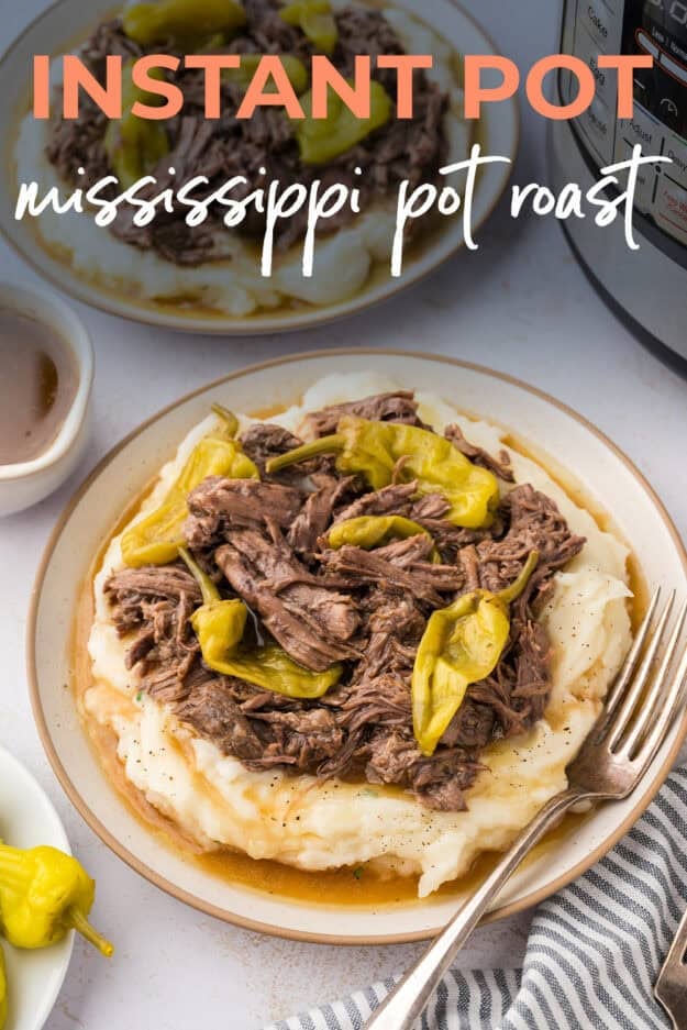 Mississippi pot roast on plate with mashed potatoes.