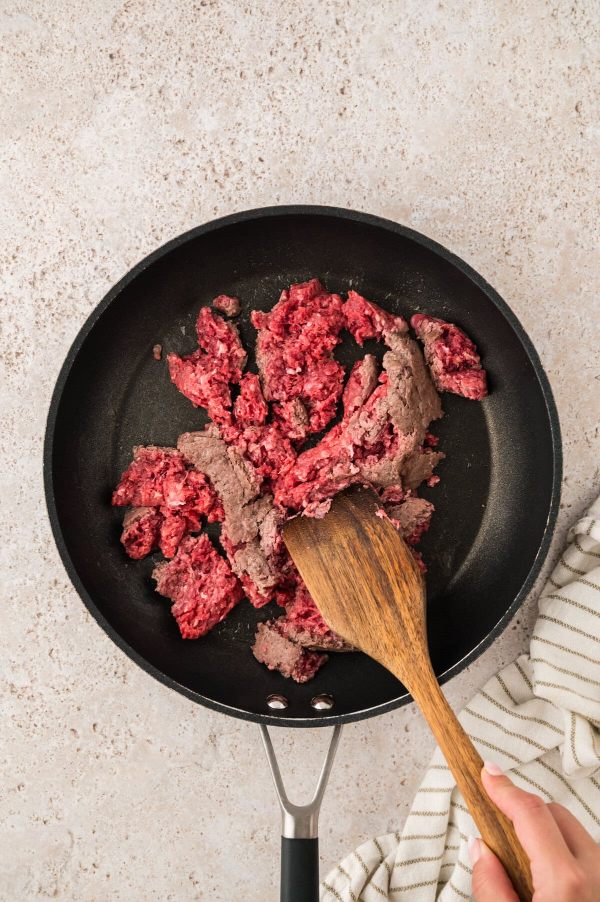 Ground beef in skillet.