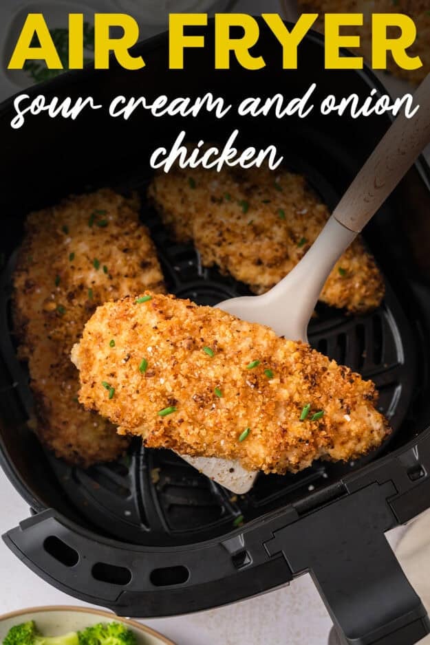 Air fryer sour cream and onion chicken on spatula.