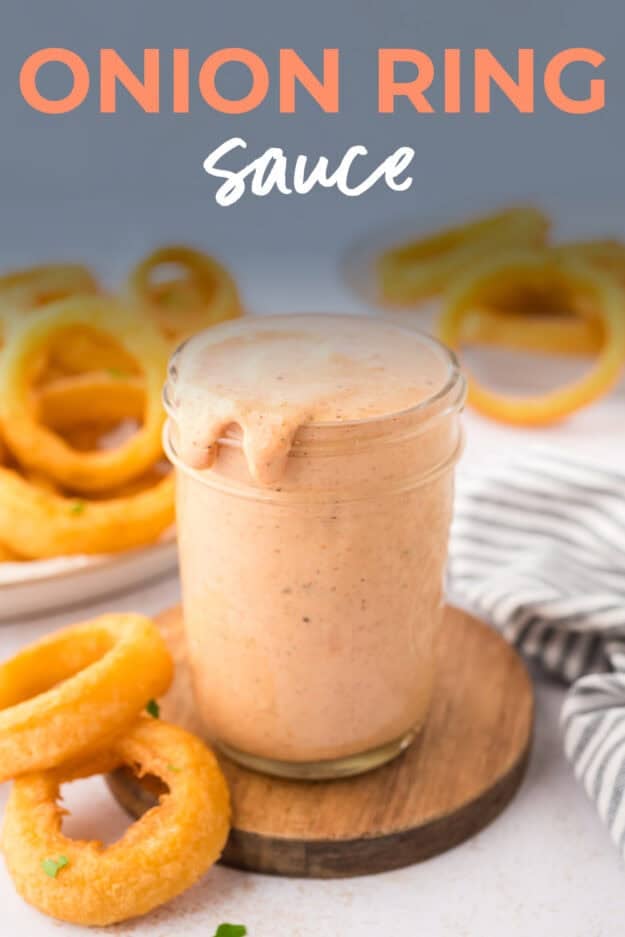 Mason jar full of pink sauce.