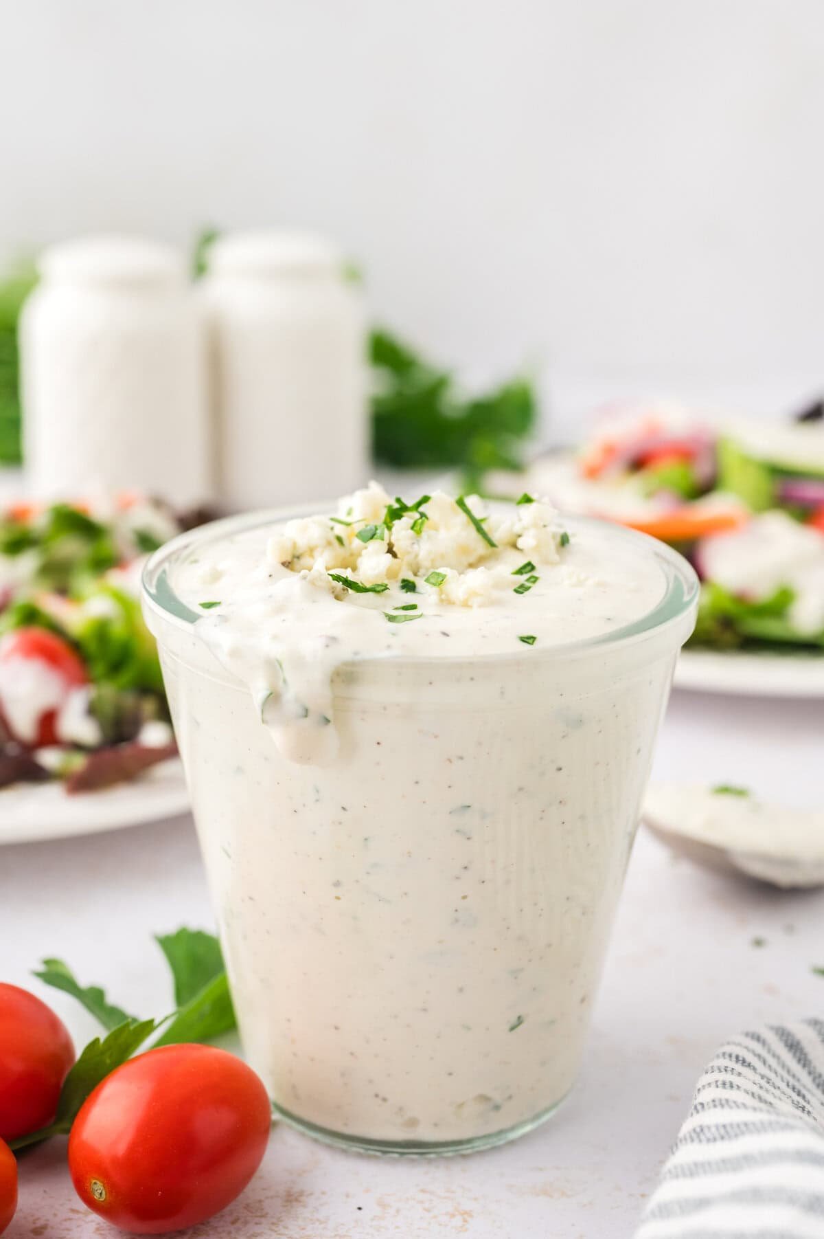 Blue cheese dressing in glass jar.