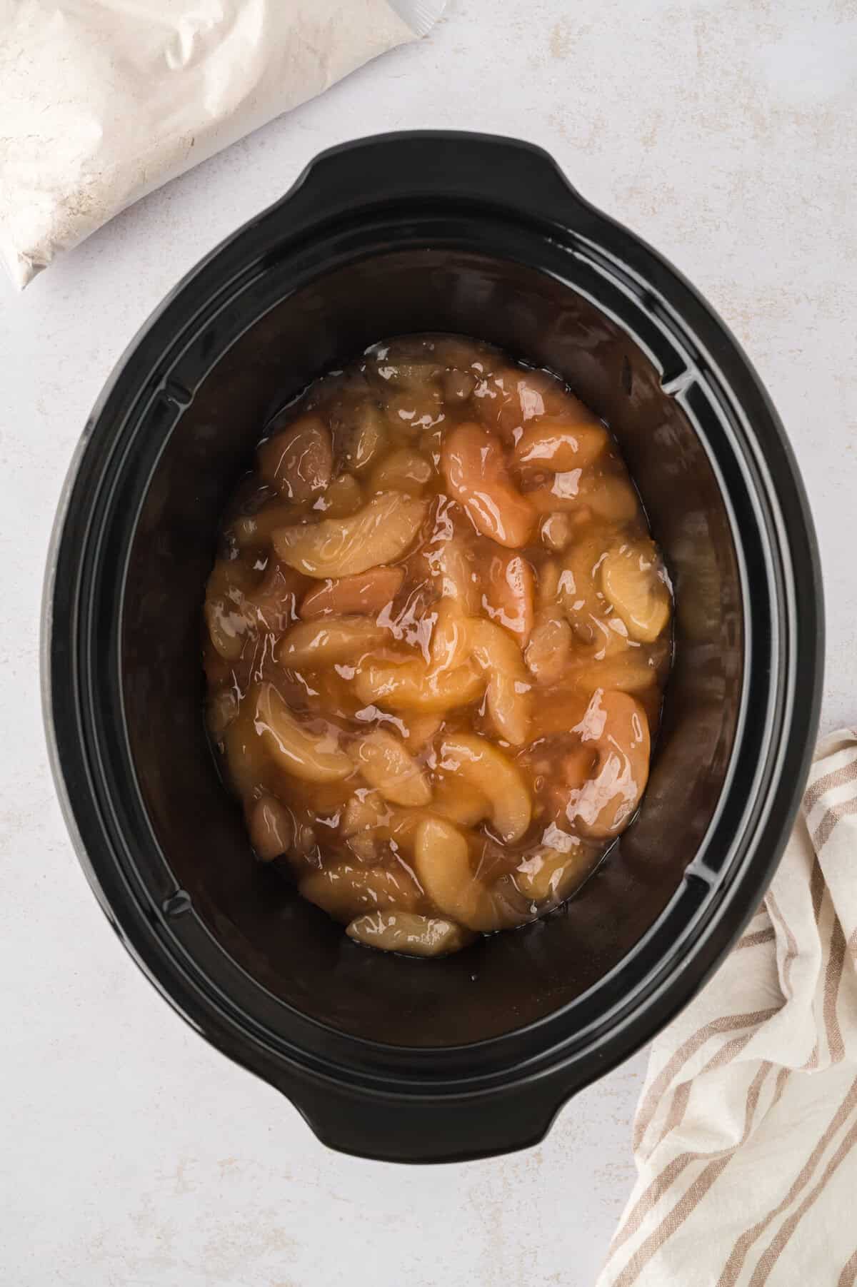 Apple pie filling in crockpot.