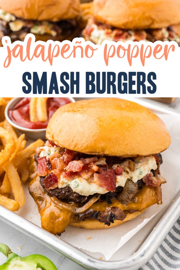 Jalapeno popper smash burger on tray with fries.