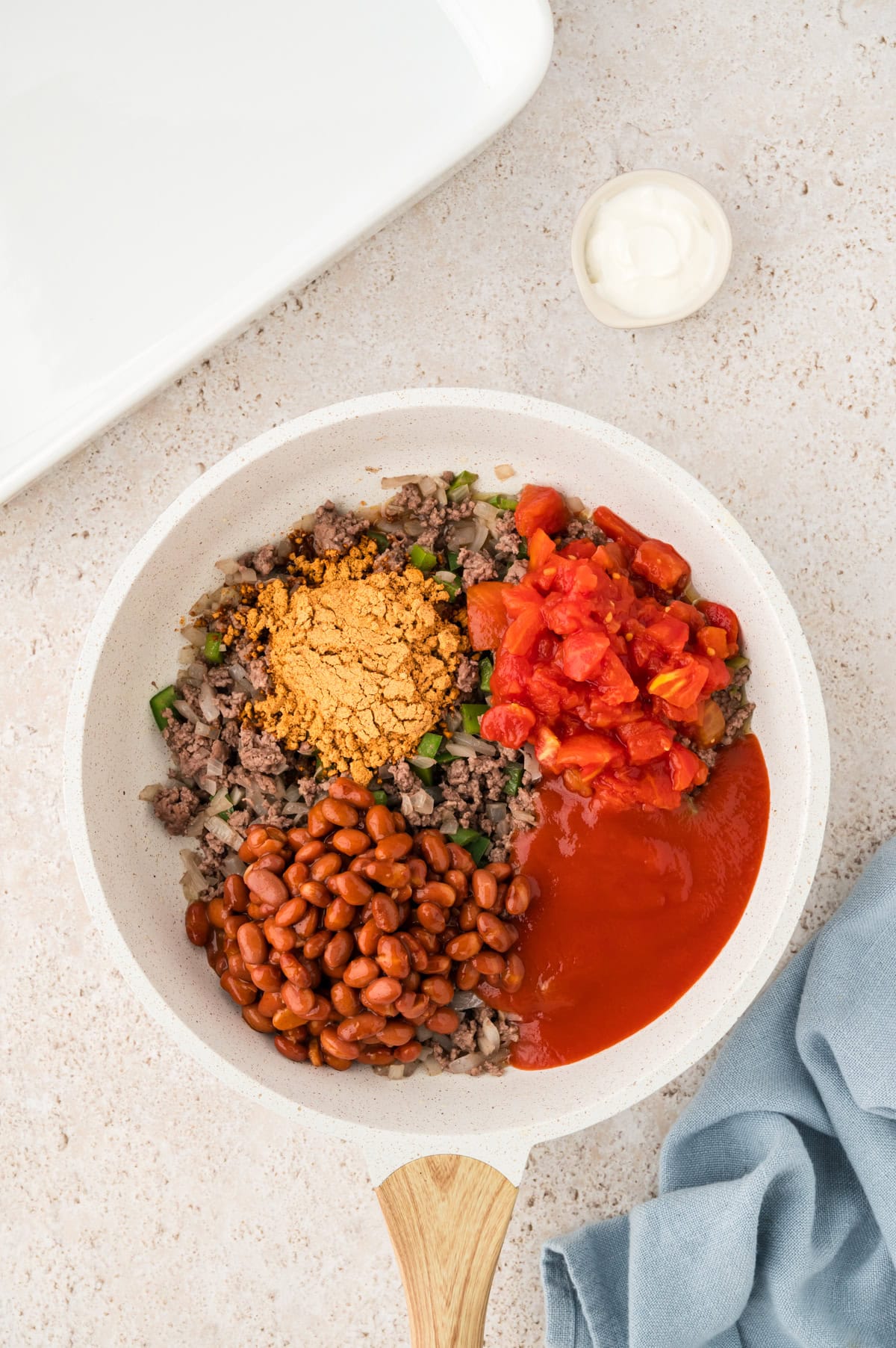 Ingredinets for chili in skillet.