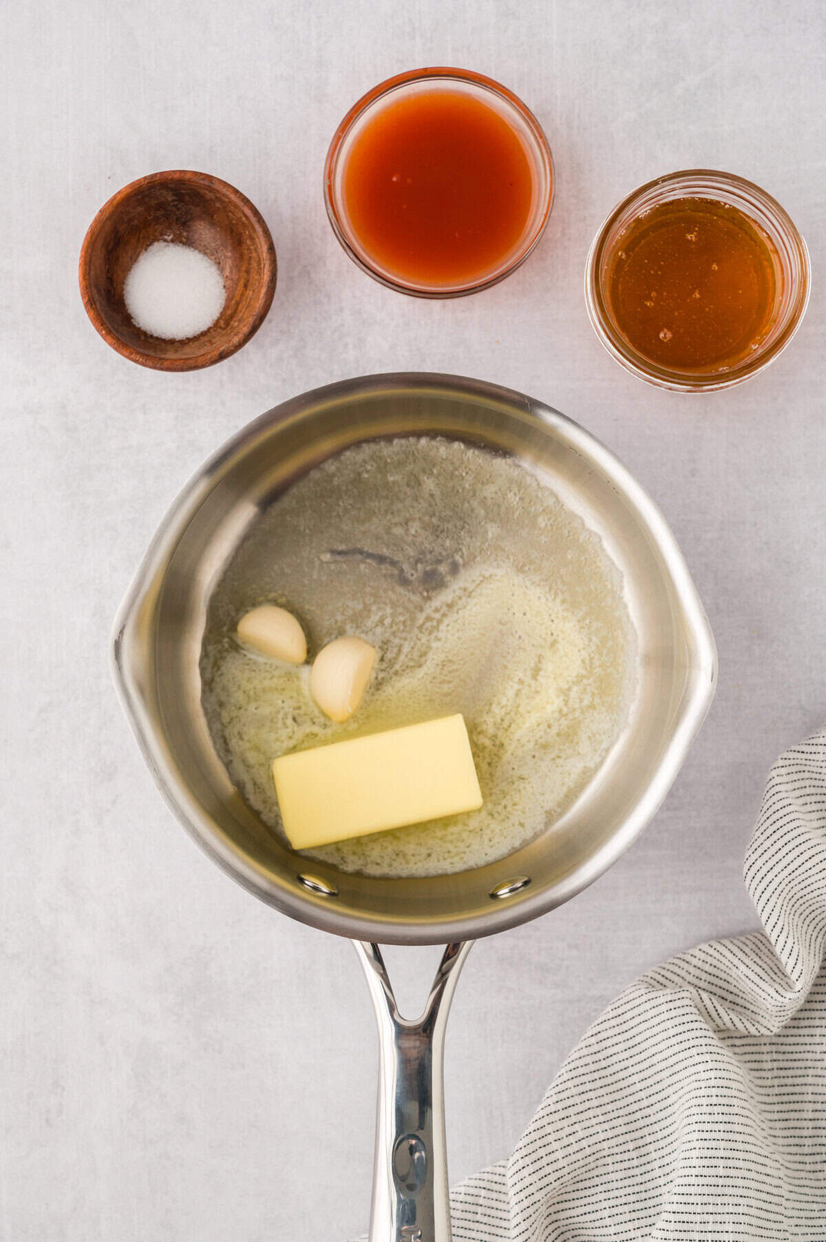 Butter and garlic in saucepan.