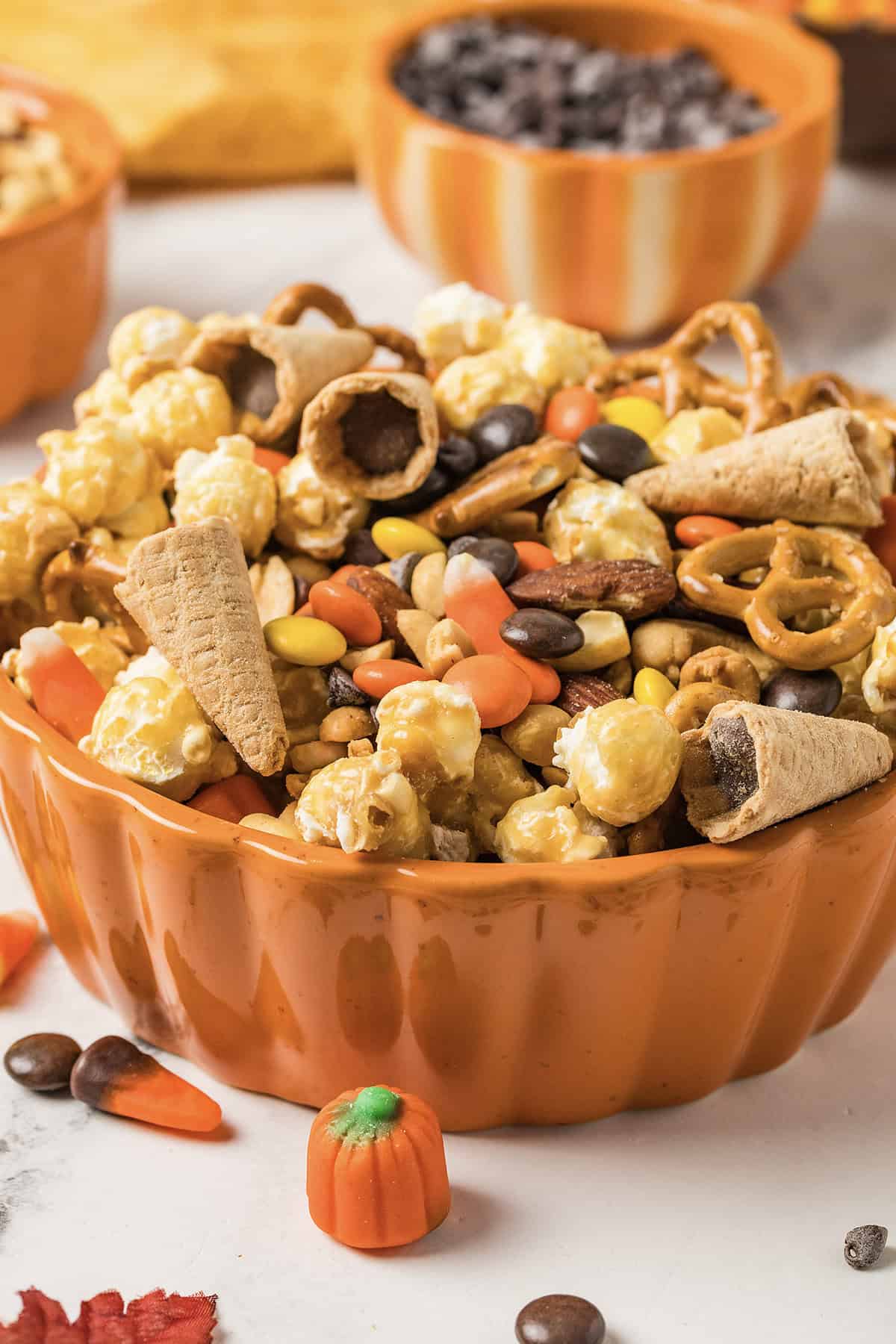 Fall trail mix in pumpkin dish.
