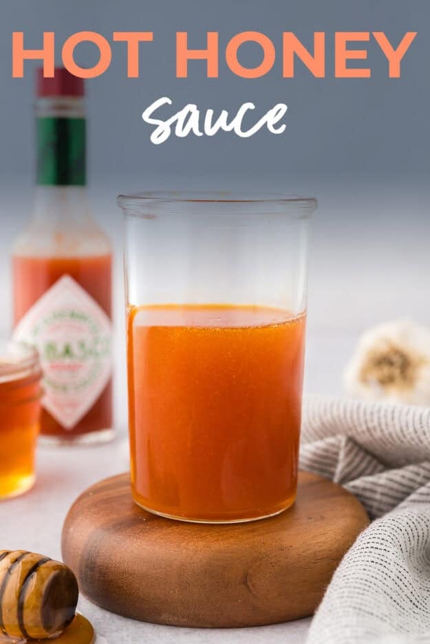 Jar full of hot honey sauce.