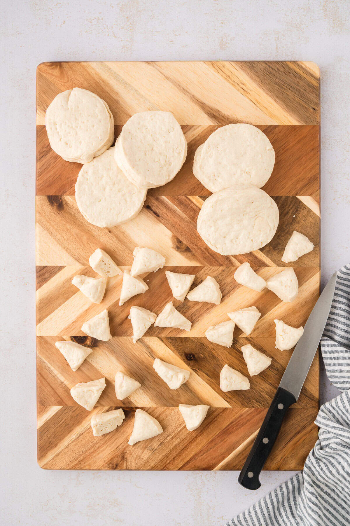 Biscuits being cut into pieces.