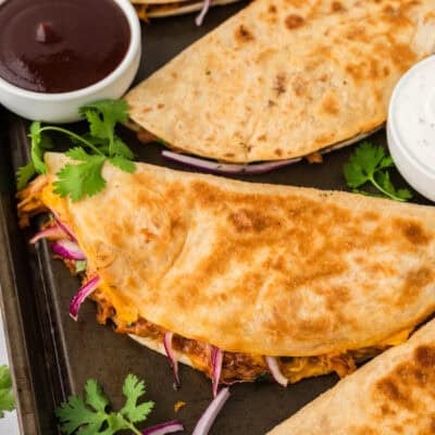 Sheet pan full of bbq chicken quesadillas.