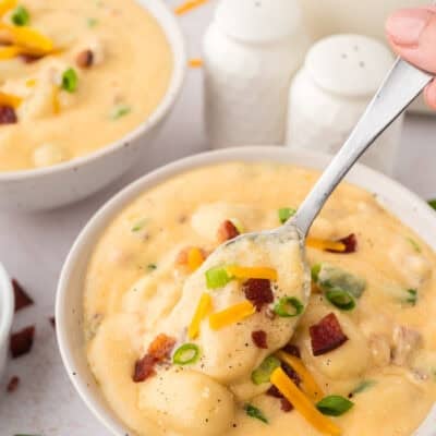 Creamy loaded gnocchi soup in bowl.