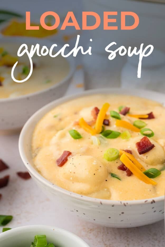 Bowl full of cheesy gnocchi soup.
