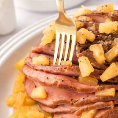 Brown sugar pineapple ham on serving platter.