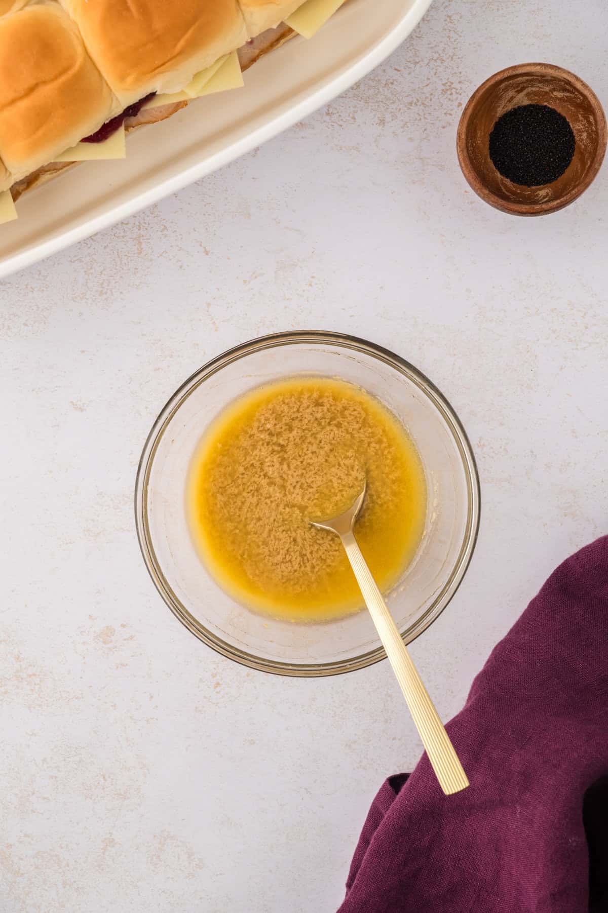 Butter sauce in small bowl.