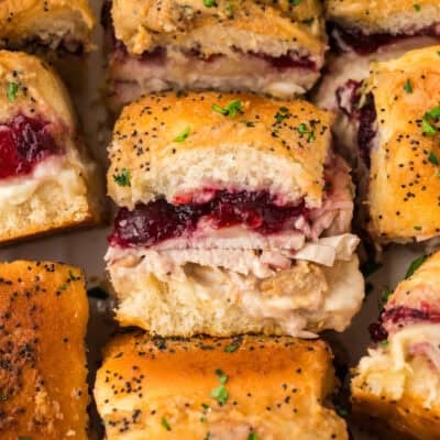 Turkey cranberry sliders in dish.